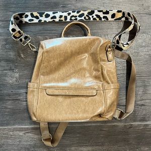 Backpack with additional animal print strap